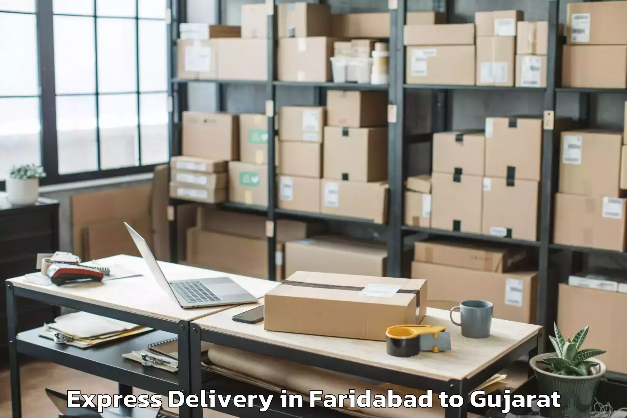 Book Your Faridabad to Karjan Express Delivery Today